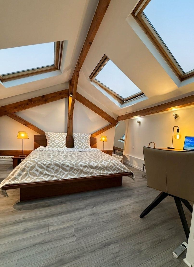 Chambre mezzanine sous les verrières